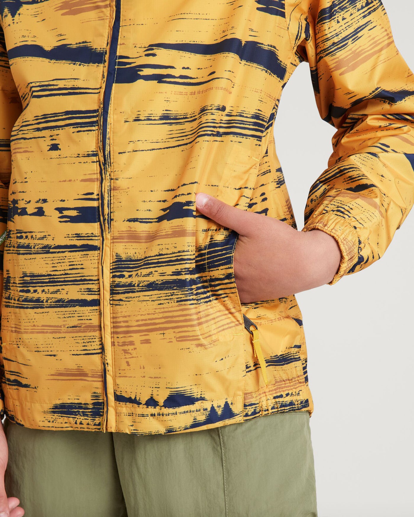 a1395_ob6_pocket-it_2l_youth_rain-jacket_gold_black_f_1744345972000