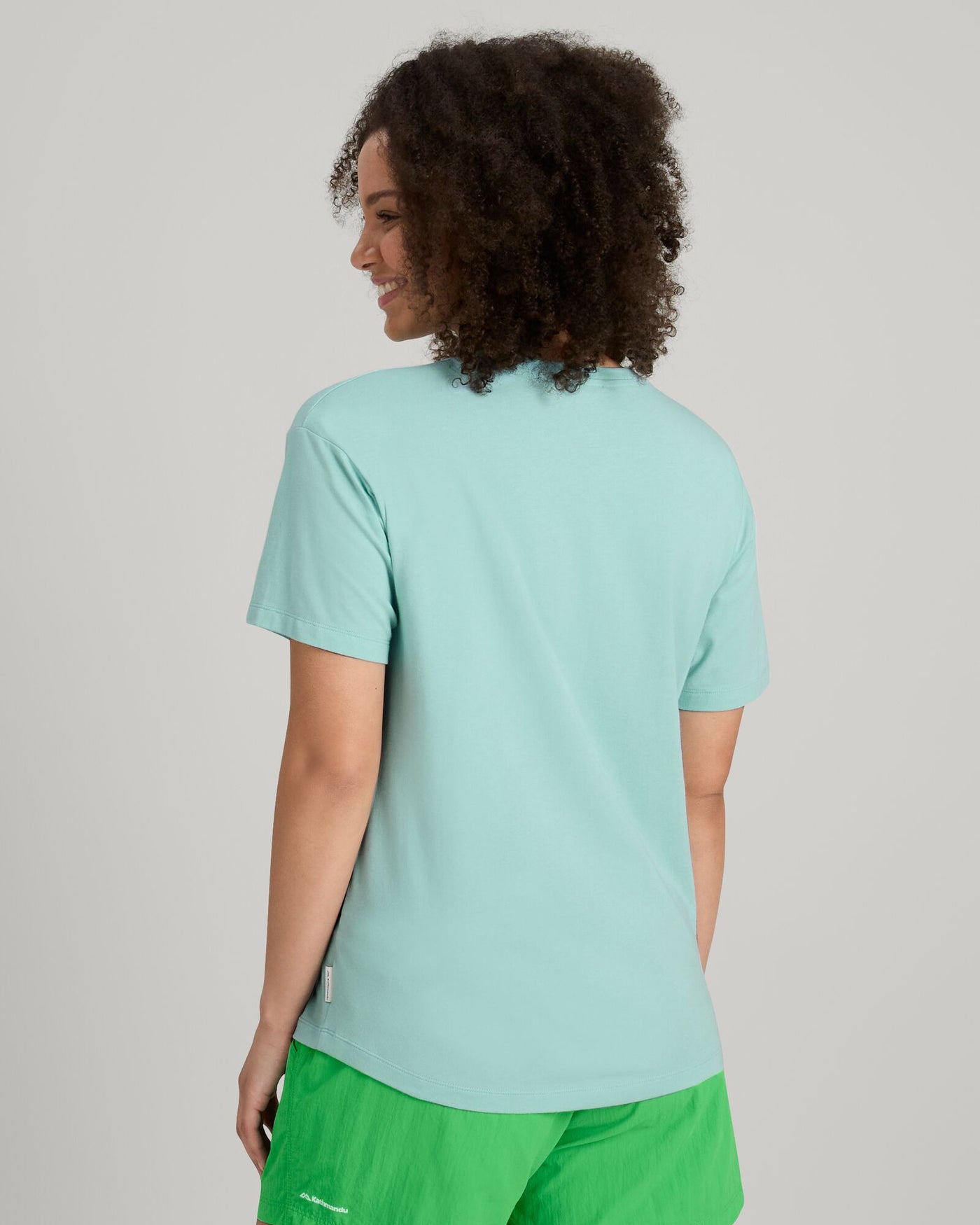 a1765_od3_kmd_logo_womens_short_sleeve_tee_gree_d_1743629682000